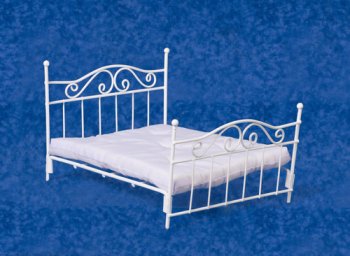 White wrought iron double bed